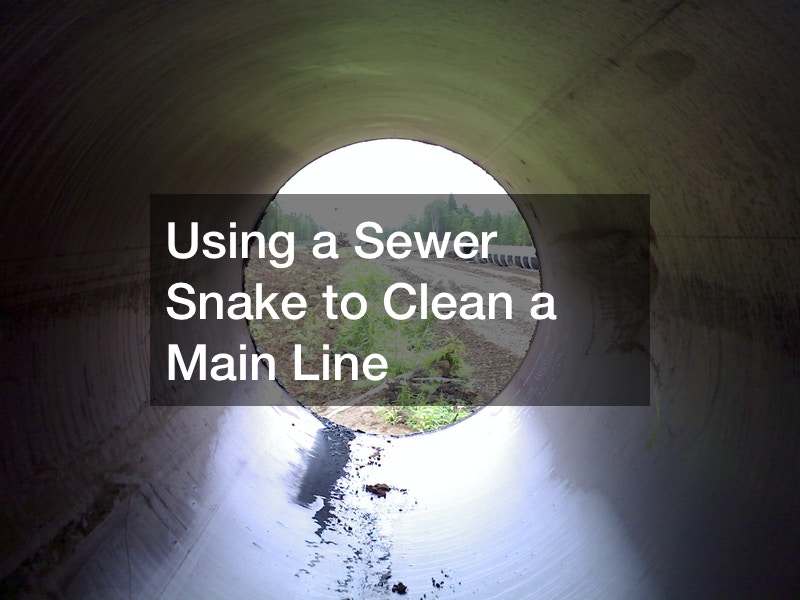 Using a Sewer Snake to Clean a Main Line